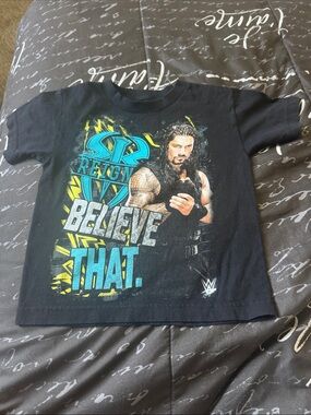 WWE Black Kids Roman Reigns "Believe That" Graphic Tee with Teal & Yellow Print
